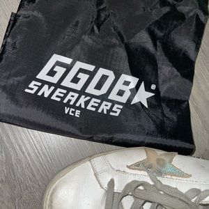 Golden Goose
SKU: 201264F12802807
Silver & Gold Superstar Sneakers	40